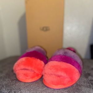 Toddler girl slippers size 11 in color pink, purple and maroon.